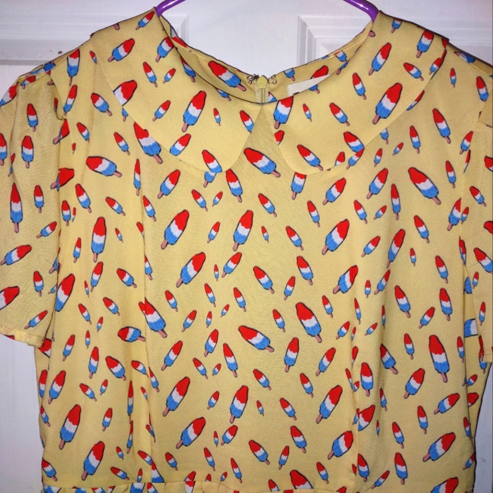 Cute retro styled dress with popsicles on it.